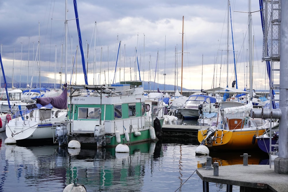 a group of boats that are sitting in the water