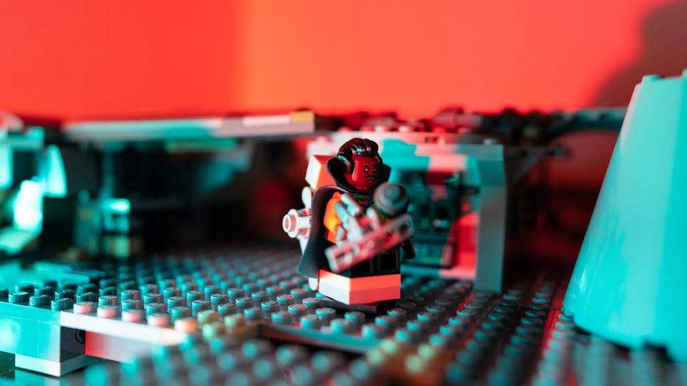 a close up of a lego figure on a table