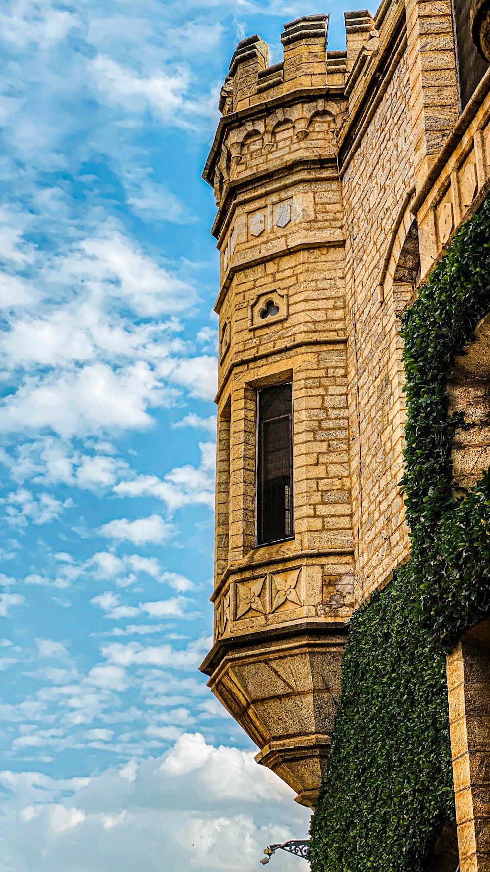 a tall tower with a clock on the side of it