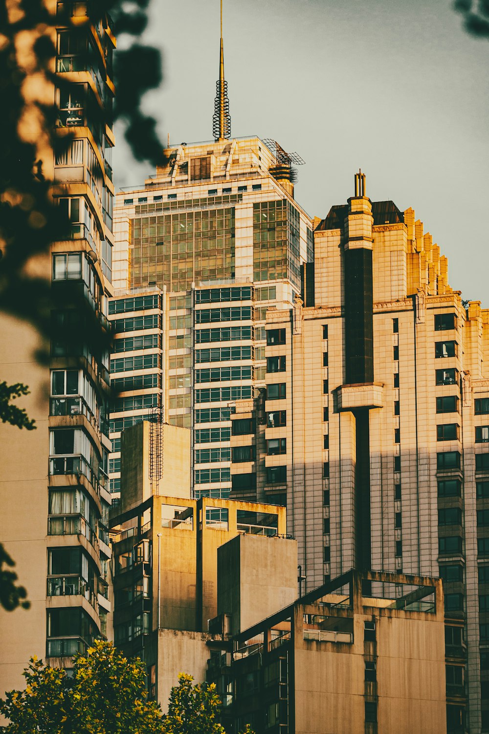 a view of some very tall buildings in a city