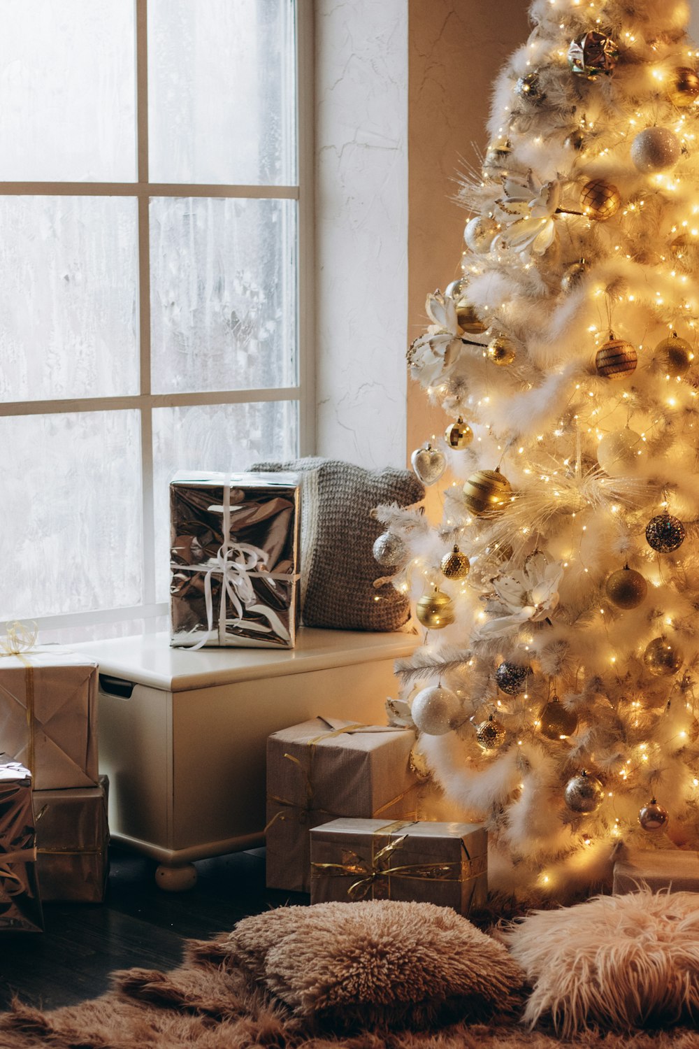 a white christmas tree in a living room