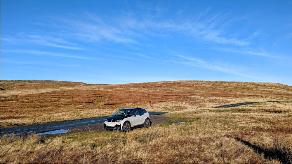 a car is parked on the side of a road