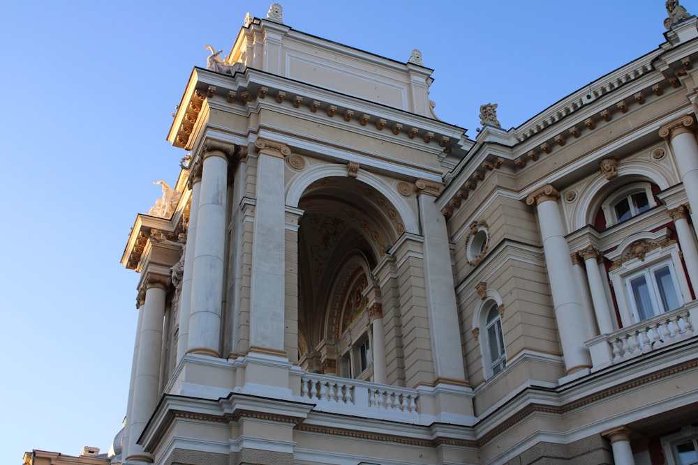 a large building with a clock on the front of it