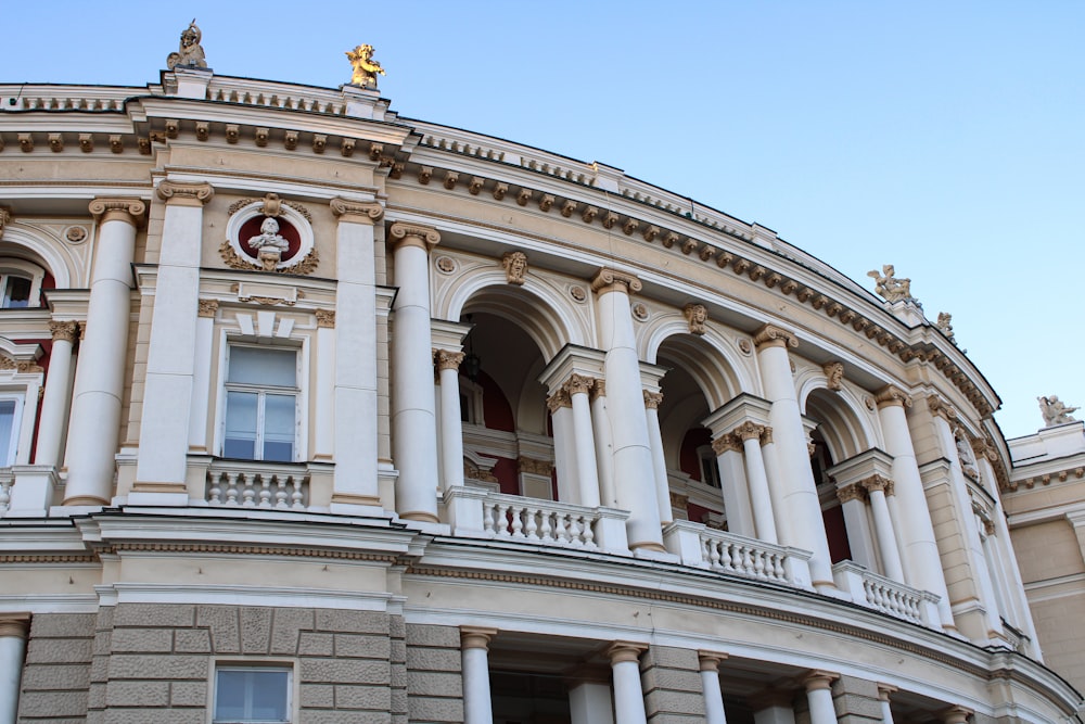 a large building with a clock on the front of it