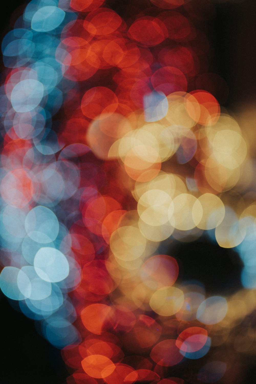 a blurry photo of a city street at night