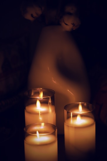 a birthday cake with lit candles