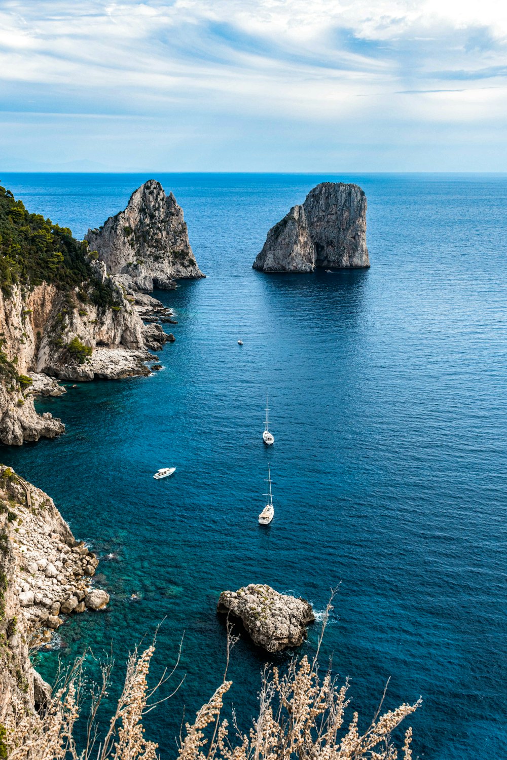 a body of water with a boat in the middle of it