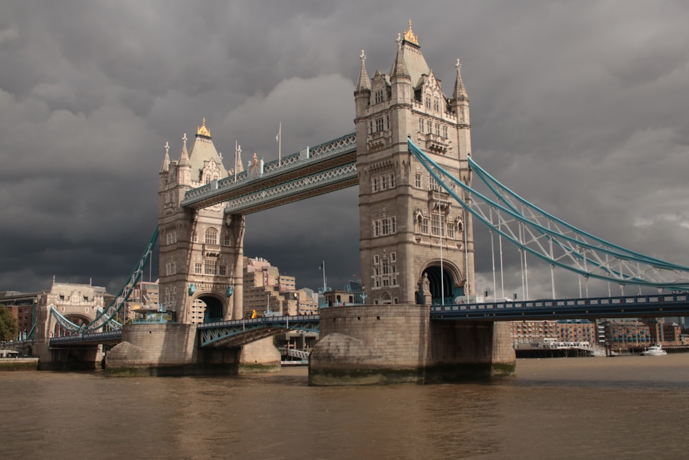 a bridge that has a very tall tower on it