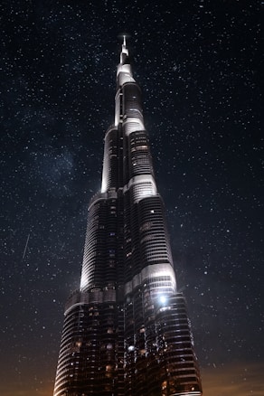 a very tall building lit up at night