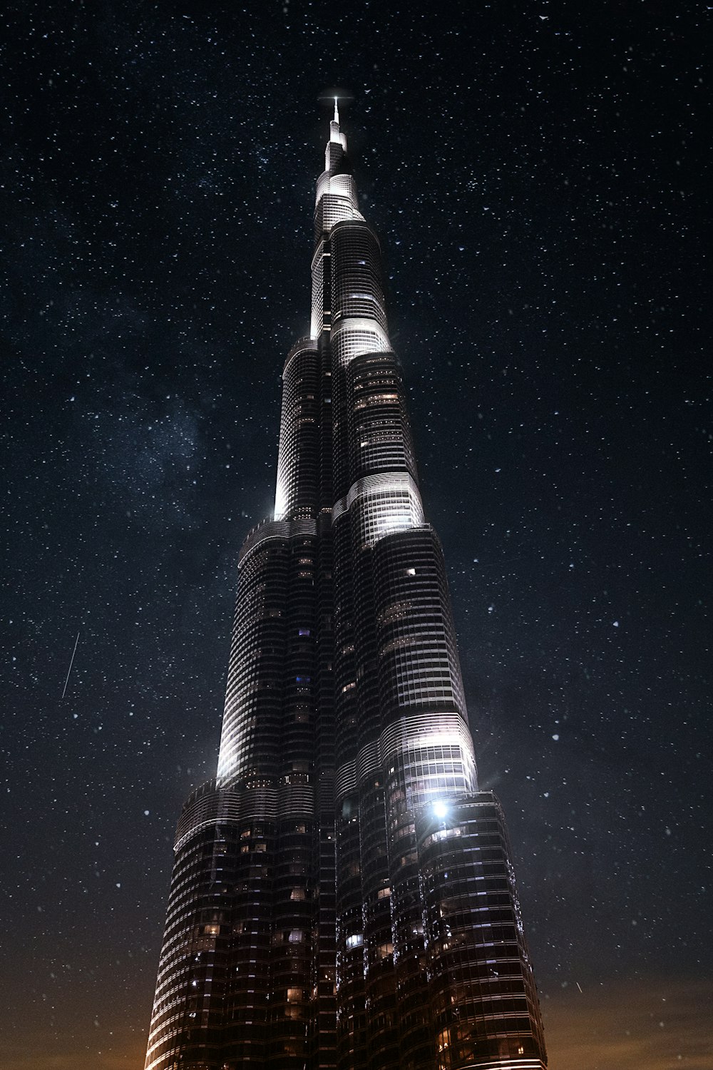 a very tall building lit up at night