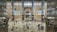 A serene interior view of the mosque with worshippers.
