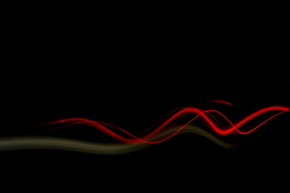 a black background with red and white lines