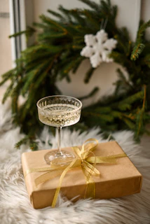 An elegant gift box containing a copper glass set, ready for gifting.