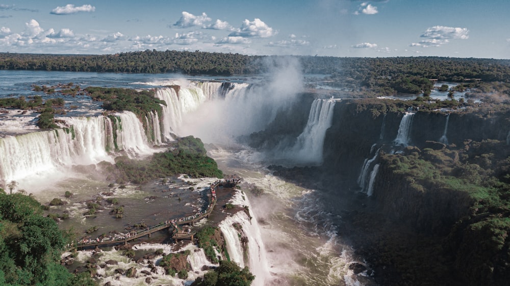 an aerial view of a waterfall and a river