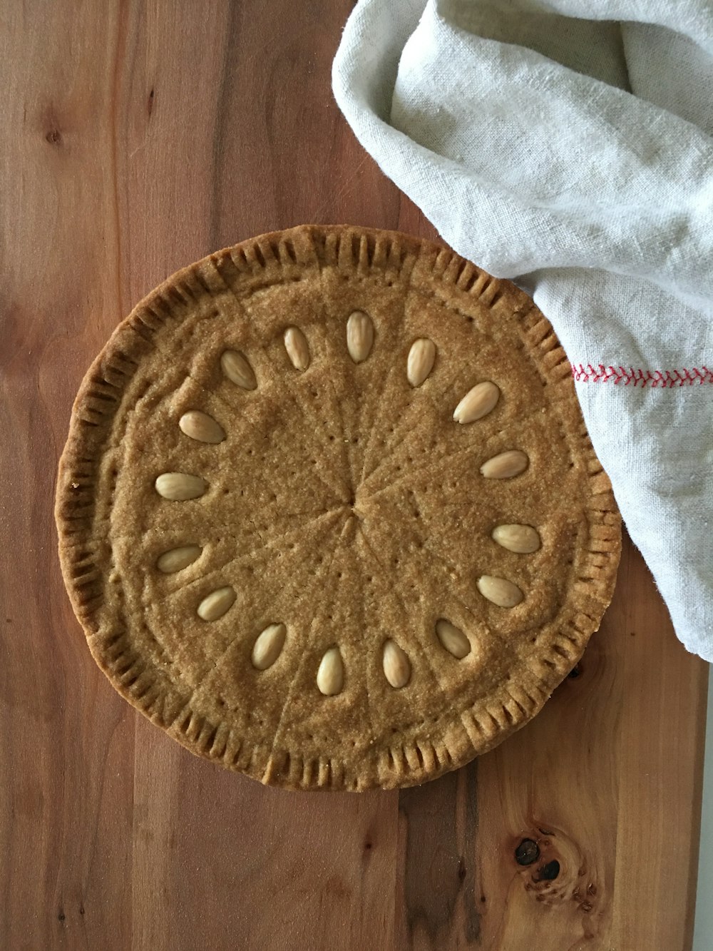 a pie sitting on top of a wooden table