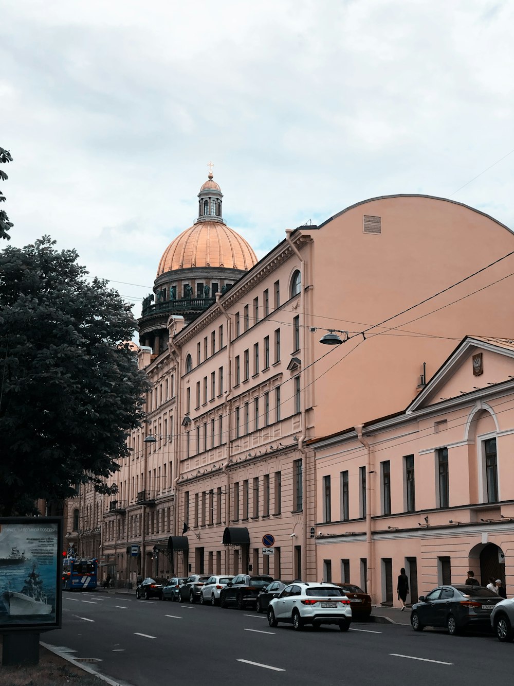 a city street with cars parked on the side of it