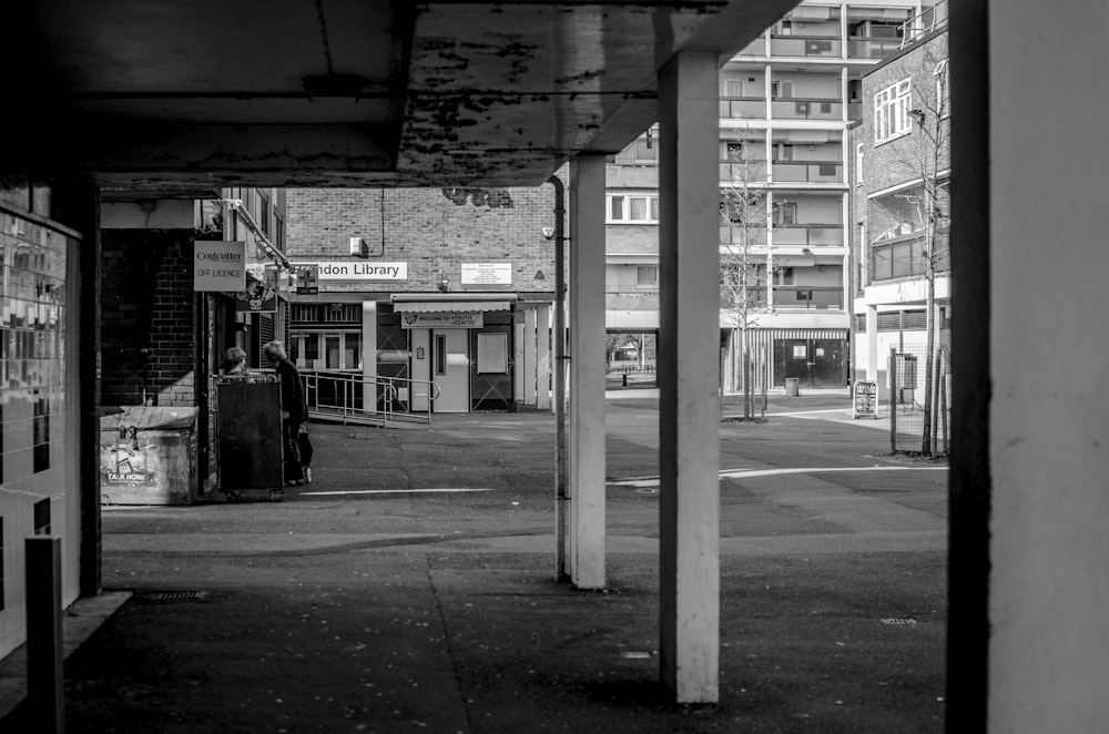 a black and white photo of an empty street