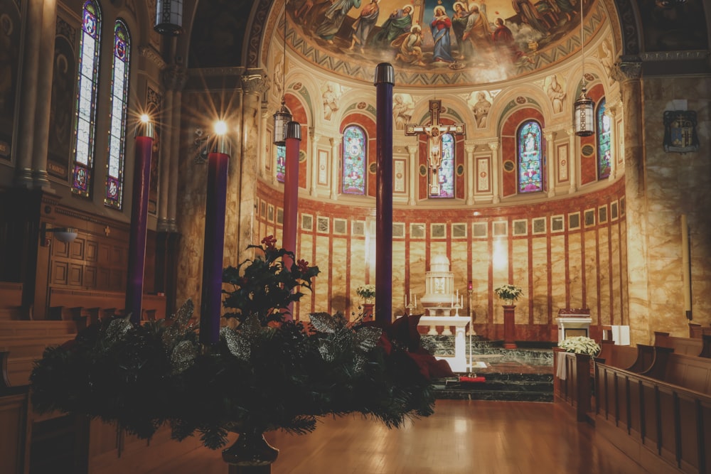 a church with a cross in the middle of it