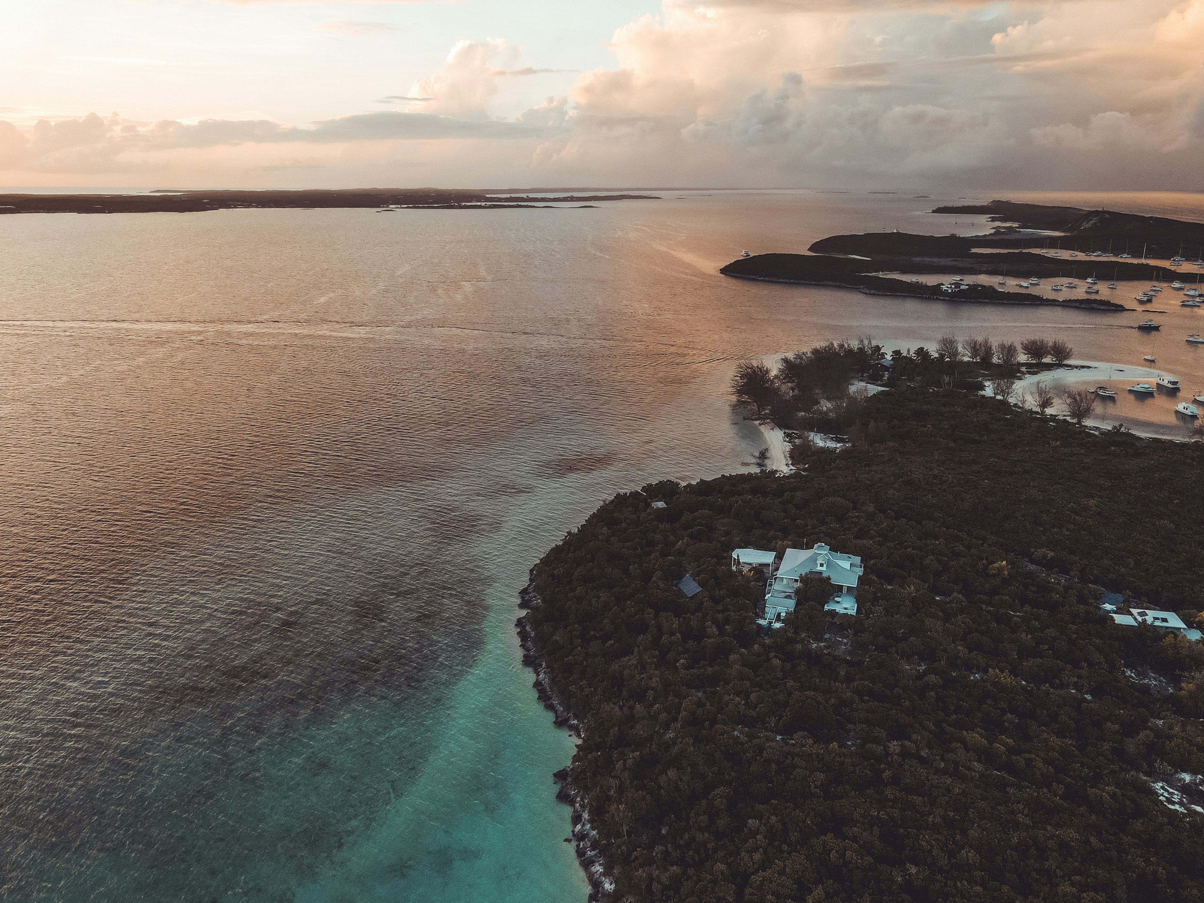 an aerial view of a small island in the middle of the ocean