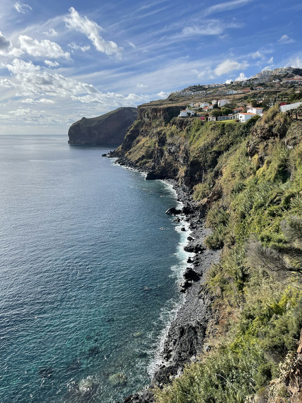 a view of the ocean from a cliff