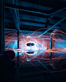 a blurry image of a circular object in a dark room