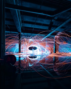 a blurry image of a circular object in a dark room
