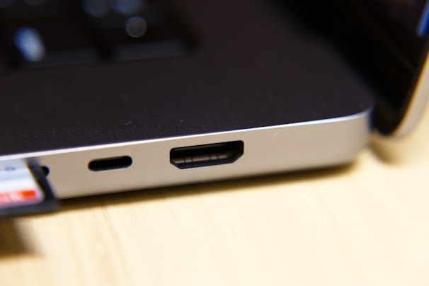 A detailed shot of a laptop’s ports and connectivity options highlighting quality craftsmanship.
