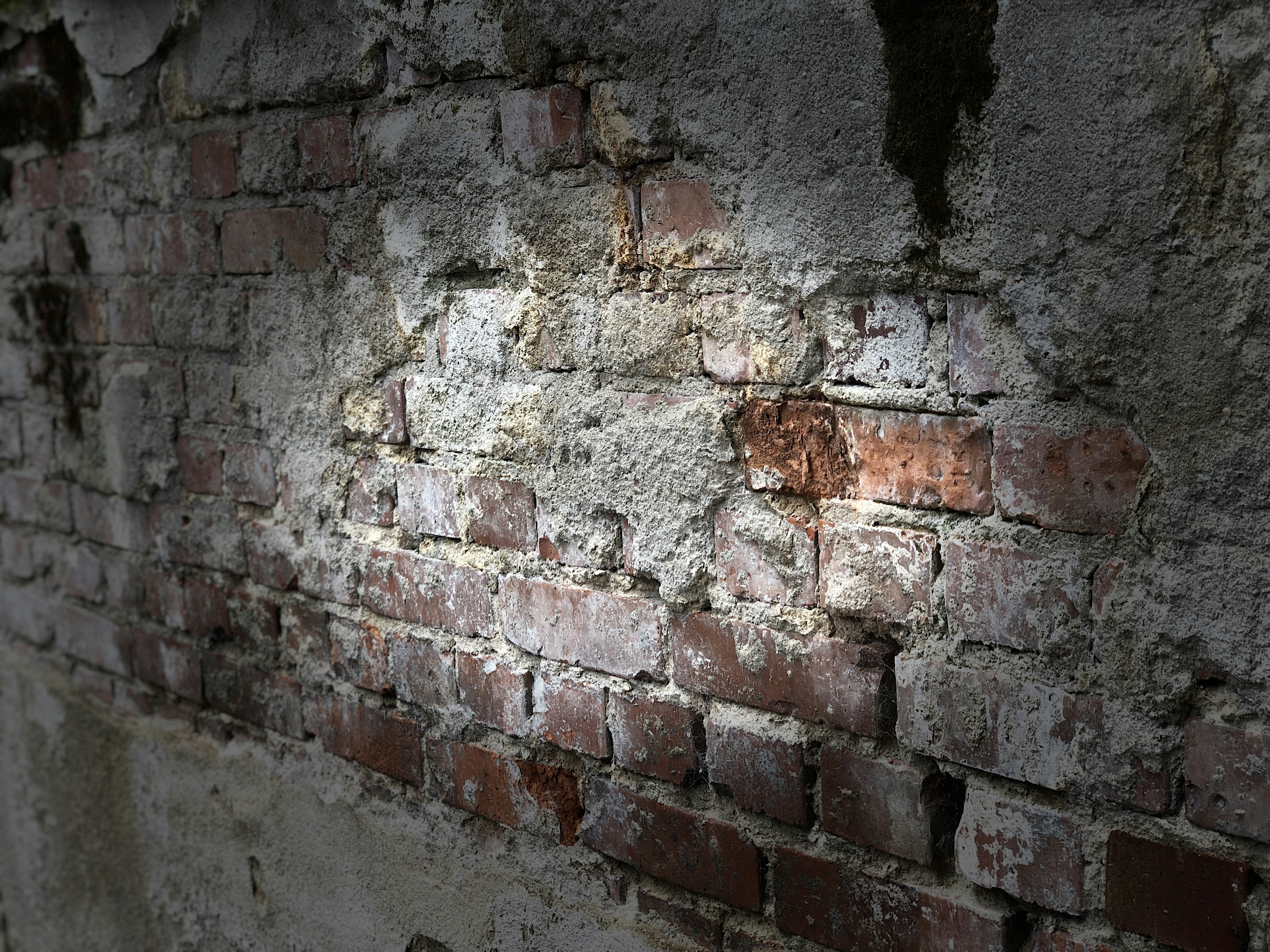 loft interior highlights exposed brick and ductwork - industrial style loft apartments