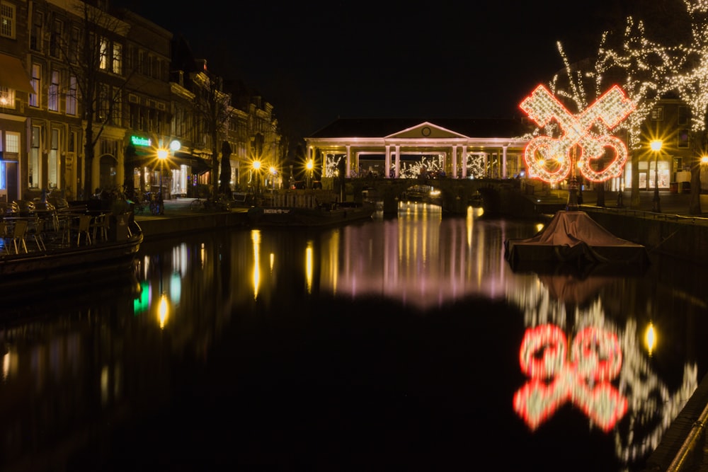 a river that has some lights on it