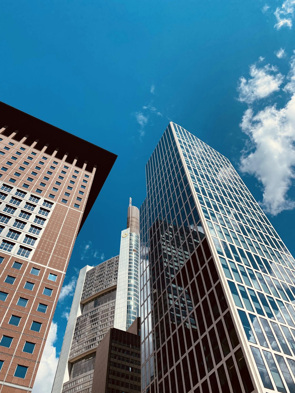 a group of tall buildings sitting next to each other