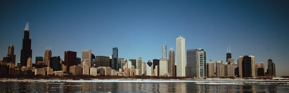 a view of the chicago skyline from across the lake