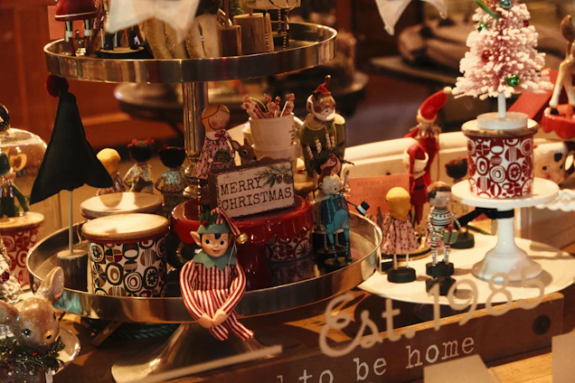 A joyful Sinterklaas and Zwarte Piet visiting children at a cozy home event, surrounded by festive decorations.