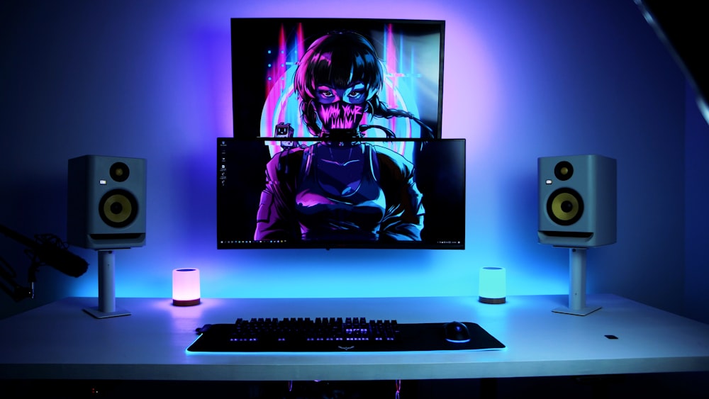 a computer monitor sitting on top of a desk