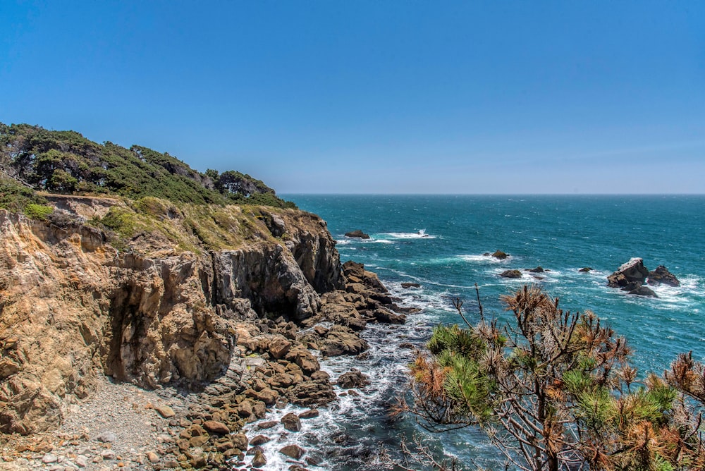 a view of the ocean from a cliff