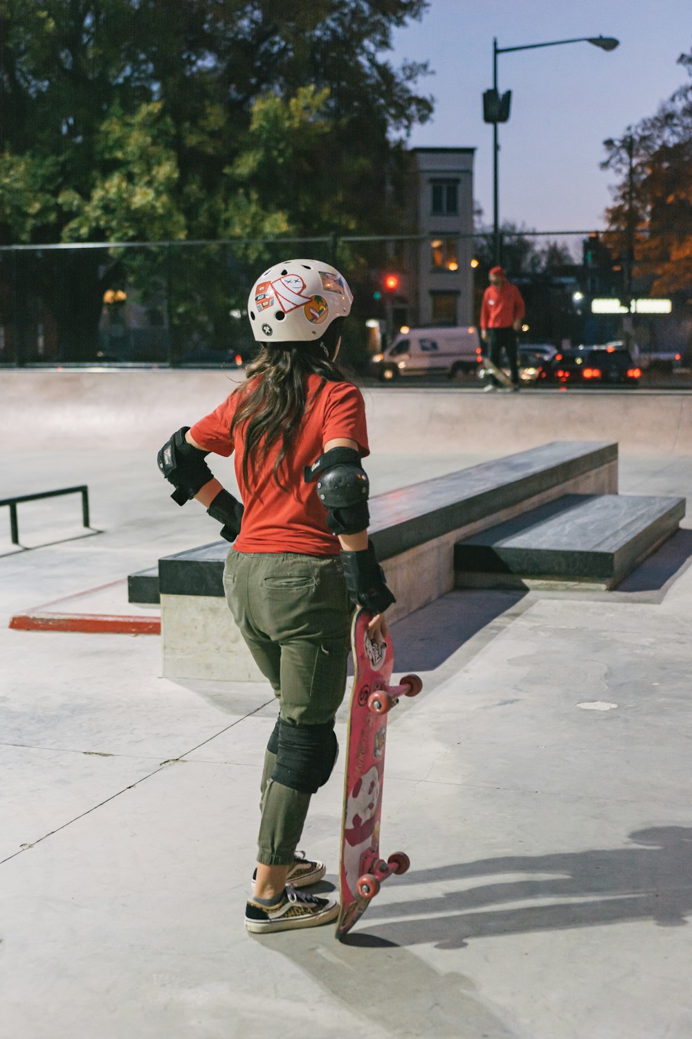 a man riding a skateboard up the side of a road