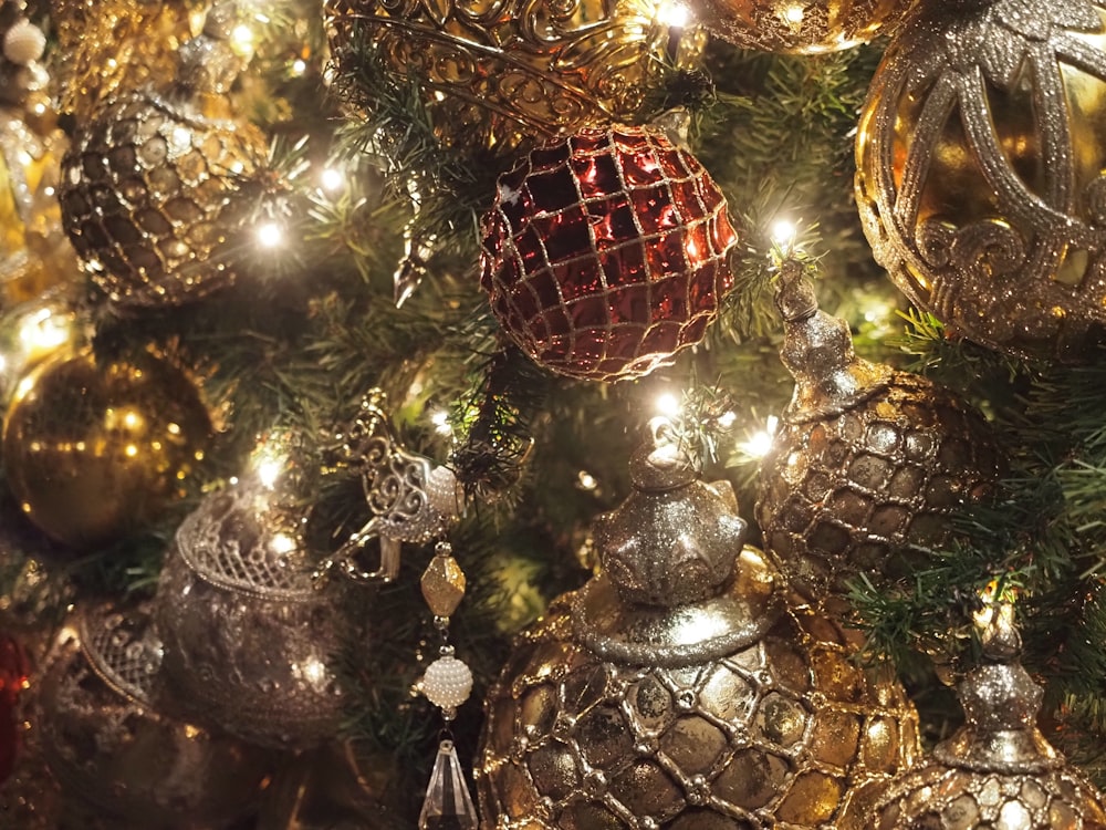 a close up of a christmas tree with ornaments