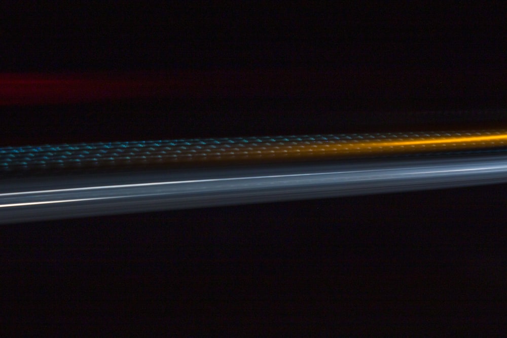 a blurry photo of a street light at night