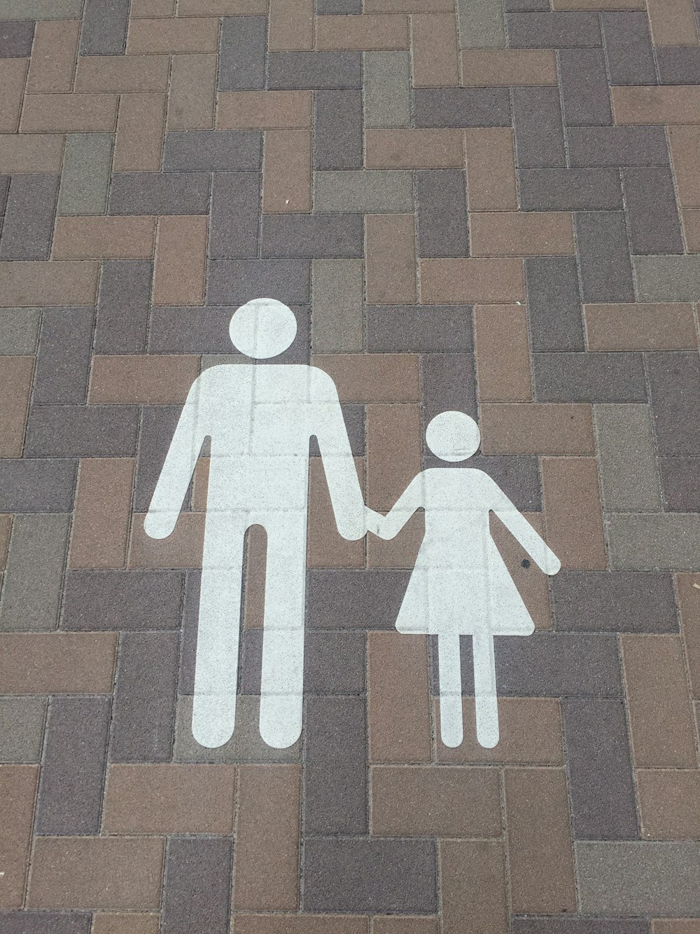 a picture of a man and a woman holding hands
