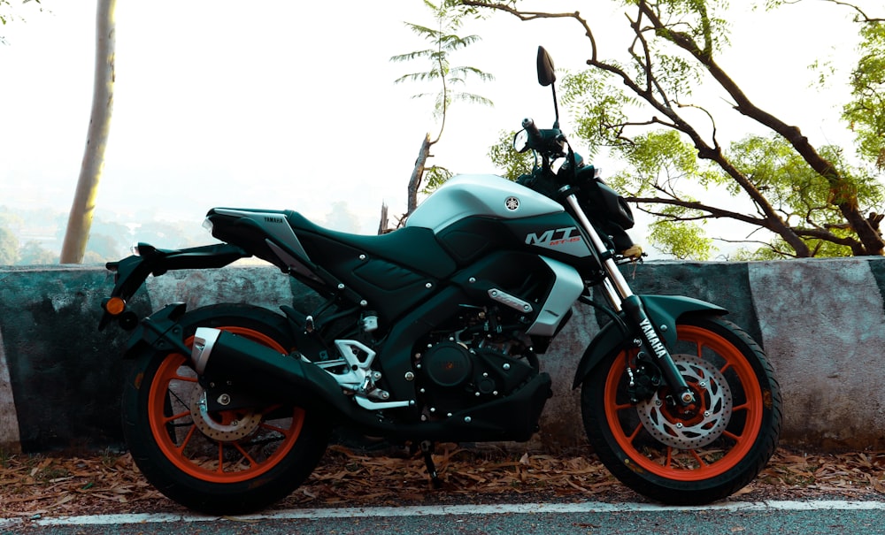 a motorcycle parked on the side of the road