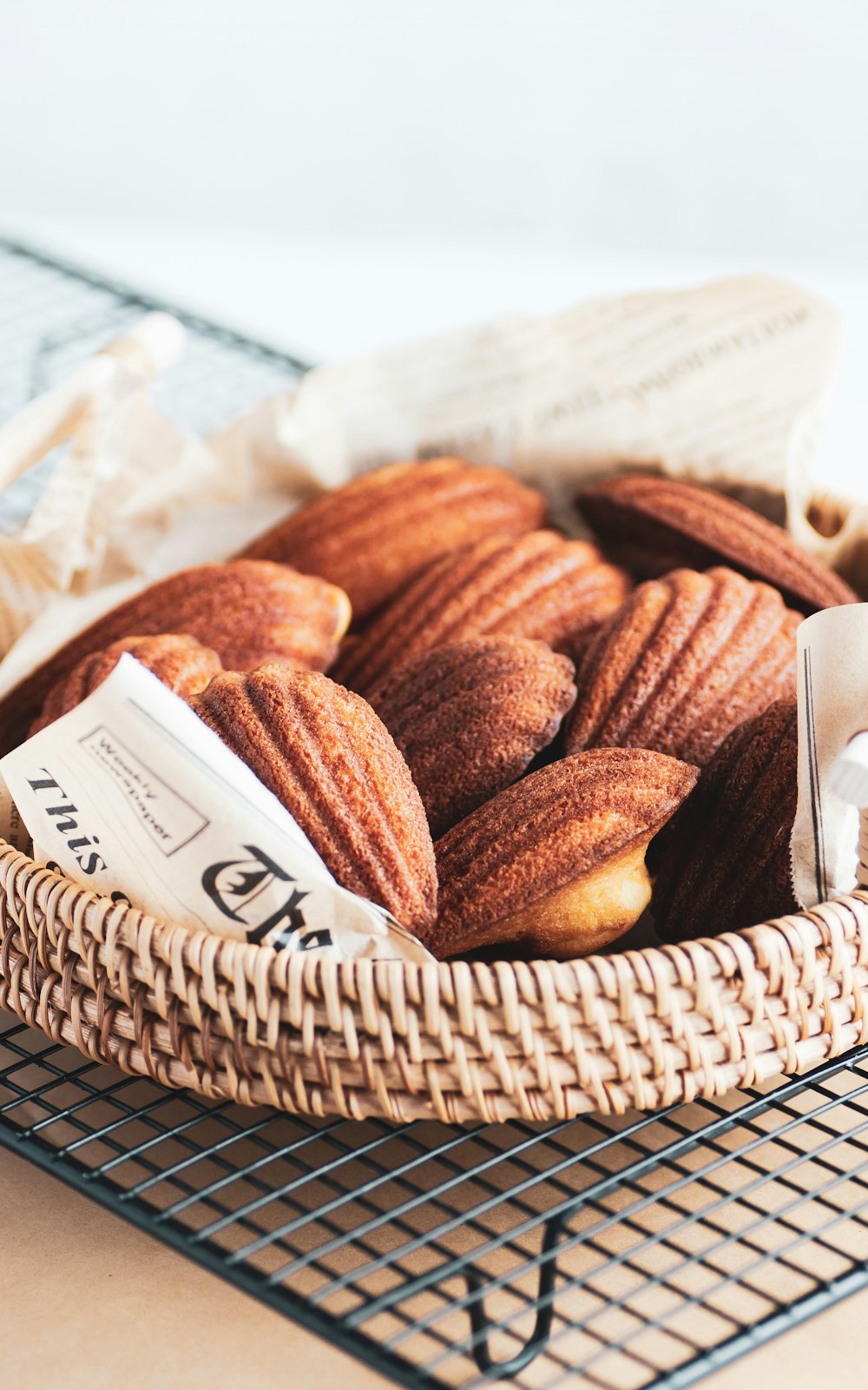 a basket filled with pastries sitting on top of a table