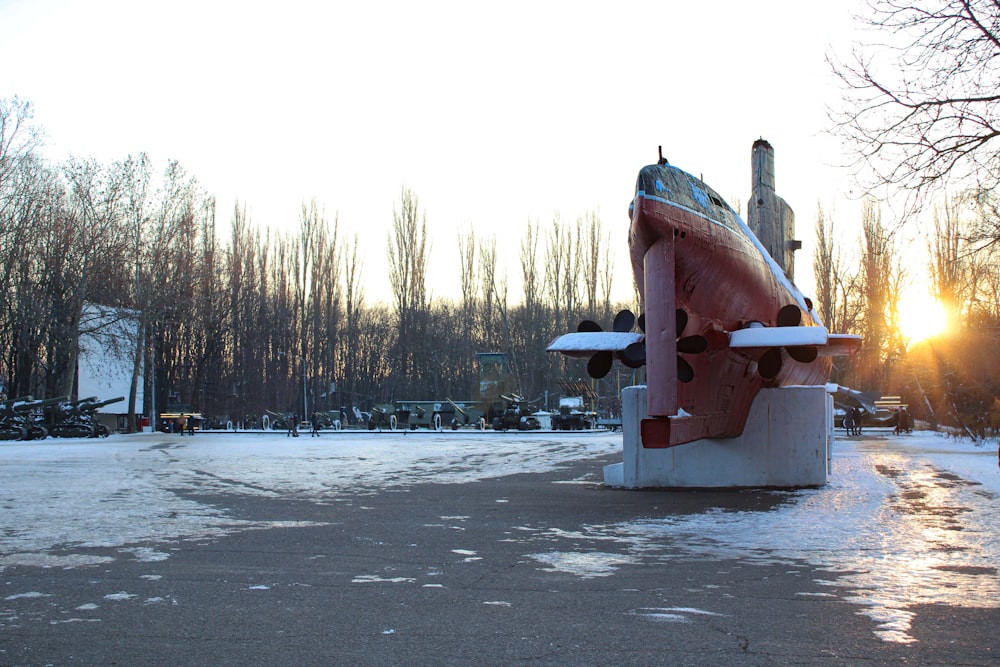 a plane sitting on top of a snow covered ground