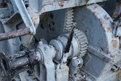 a close up of a machine with rust on it