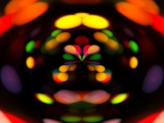 Abstract colorful sound waves visualized on a digital screen in a dark room.