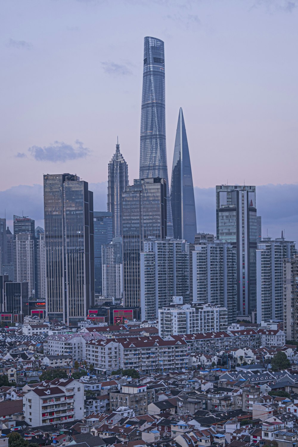 a view of a large city with tall buildings