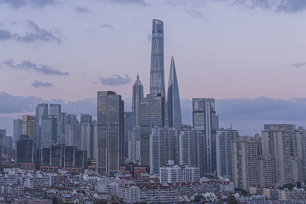 a very tall building towering over a city