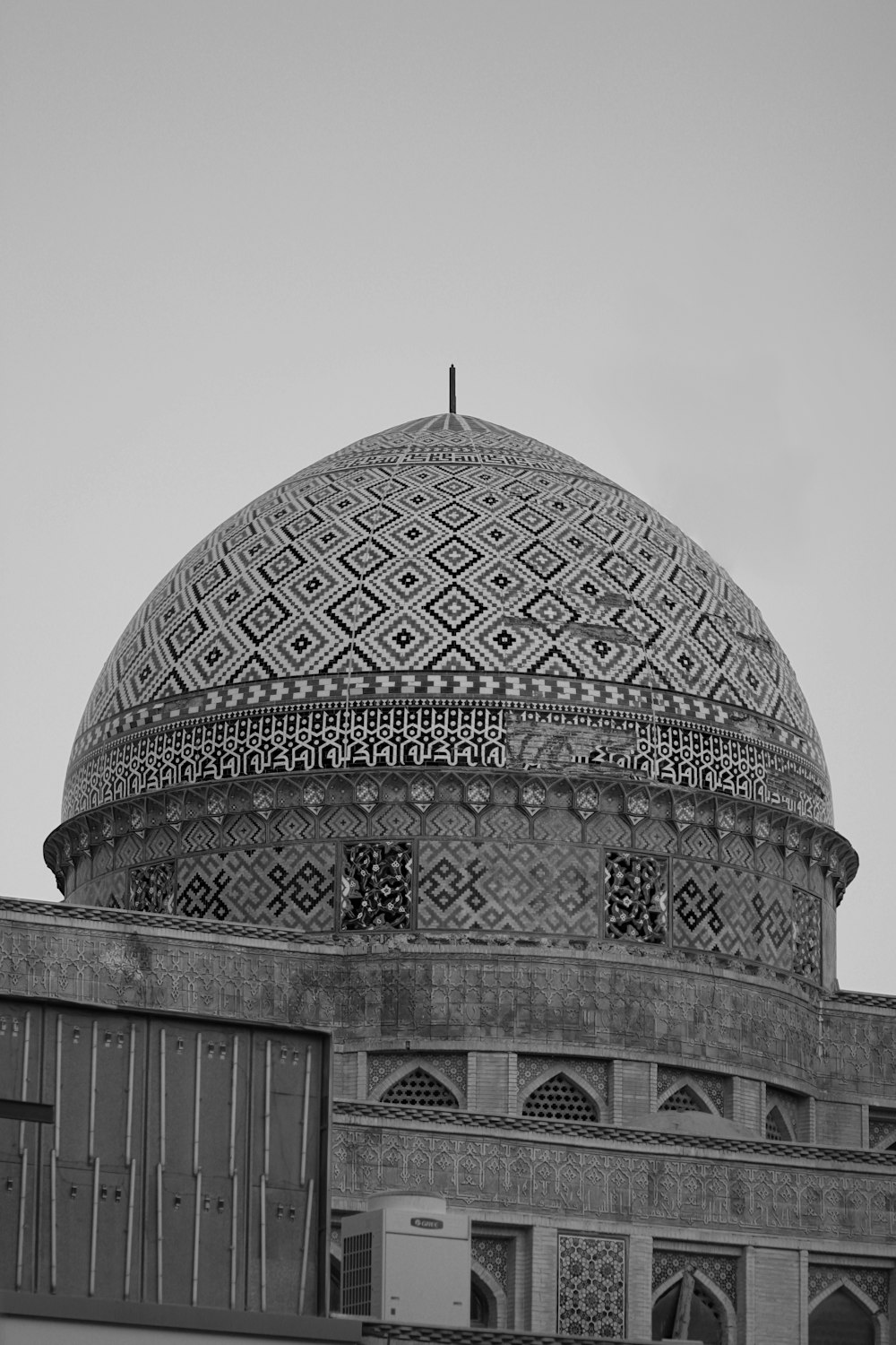 a black and white photo of a dome on top of a building