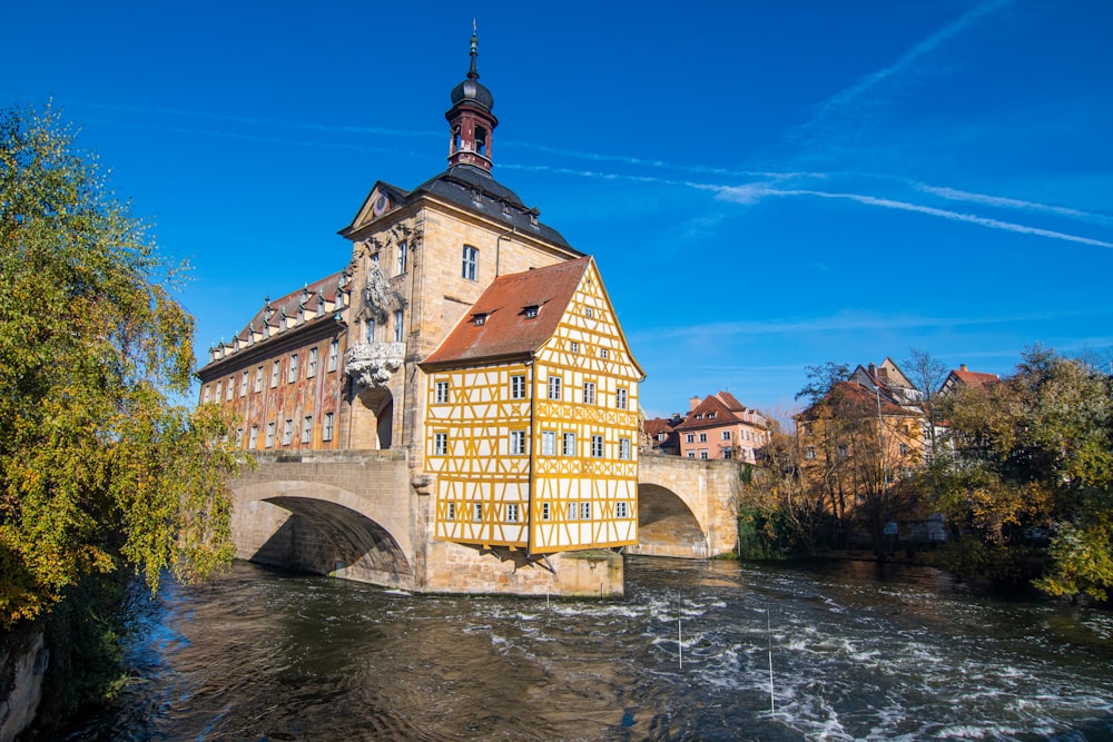 a building on a bridge over a river