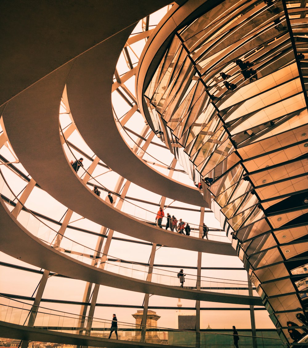 a group of people standing inside of a building