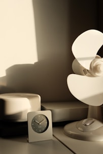 A sleek air purifier quietly refreshing a modern living room.