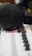 Close-up of headphones resting on a mixing console with colorful soundwave visuals in the background.